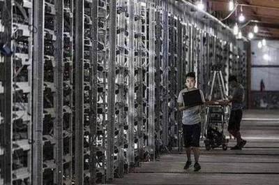 A large-scale Bitcoin mining farm equipped with advanced cooling and power infrastructure.