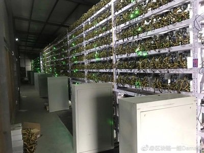 Large-scale cryptocurrency mining farm utilizing energy-efficient hosting